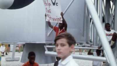 Don't get to the moon
and forget the poverty - Black in Space: Breaking the Color Barrier
