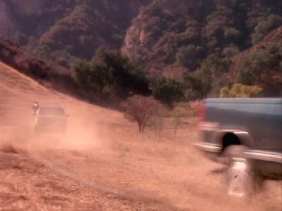 Don't let him get away.
Shoot out the tyres. - JAG