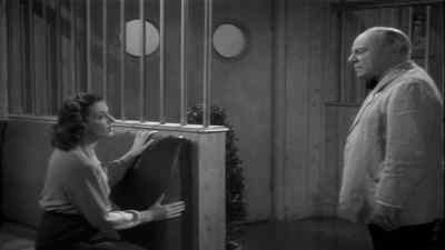 Don't let him go too far, Ann. - Between Two Worlds