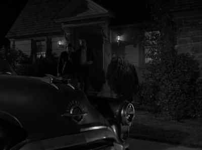 Don't put the lights on, yet.
Come here. - Alfred Hitchcock Presents