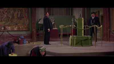 Don't stand there gaping.
Get to your post, man! - How to Steal a Million