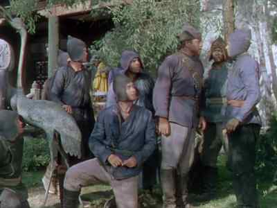 Door at side.
Men and horses wait. - Destination Gobi
