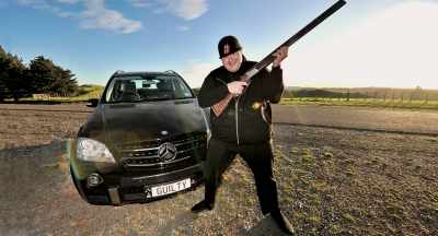 [Dotcom]
One was taken at a resort - Kim Dotcom: Caught in the Web