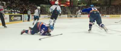 Down on the ice is LaFlamme.
He's spitting blood. - Goon: Last of the Enforcers