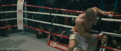 Drago summons the strength, manages to make the count. - Creed II