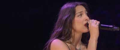 (dramatic music)
(punch thuds) - Olivia Rodrigo: GUTS World Tour