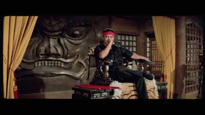 'Dressed in traditional
black karate gi clothing, - The Final Game of Death