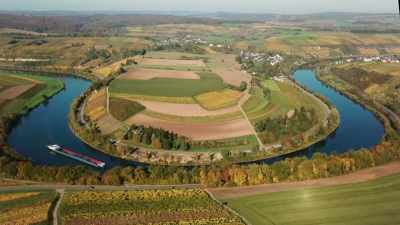 Dropping temperatures turn green fields
to golden brown, - Europe From Above