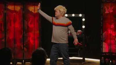 (drum music)
(audience laughing) - Chris Grace: As Scarlett Johansson