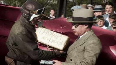EARLE, ON THE LEFT, FLIES
HIS SHOCKING FOOTAGE HIMSELF - America in Color