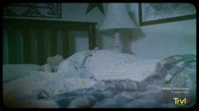 ED: The Smurls lying in bed
one night - Devil's Road: The True Story of Ed and Lorraine Warren