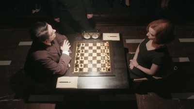 Elizabeth Harmon plays pawn to Queen four. - The Queen's Gambit