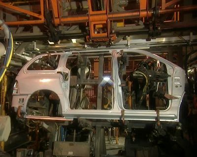 ELSEWHERE, ROBOTS
WORK ON THE BODY PANEL - How It's Made
