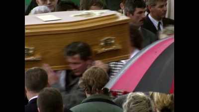 EMMA: I remember
walking behind the funeral, - No Stone Unturned