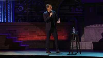 Eram îmbrăcat lejer,
iar el se uita la mine - Gad Elmaleh: American Dream