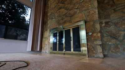 [Erin] This fireplace
has to go. - Renovation Impossible