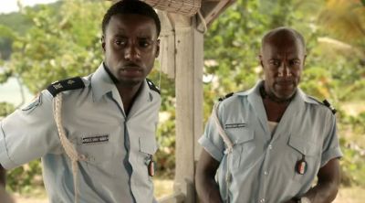 Erm, Fidel. For you. - Death in Paradise