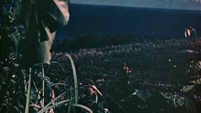 EVEN AS THE NORTHERN
COAST COMES INTO VIEW, - The Pacific War in Color