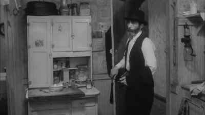 Evening, missus.
He must work late again. - Hester Street