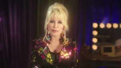 Everybody puts me on
some sort of a pedestal, - Dolly Parton's Mountain Magic Christmas