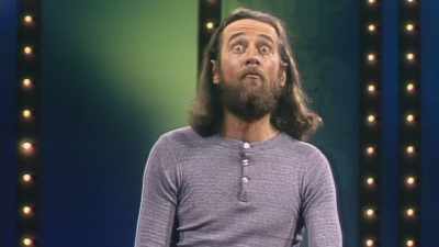 -(EXHALES, MIMICS PIGEON COOS)
-(AUDIENCE LAUGHING) - George Carlin's American Dream