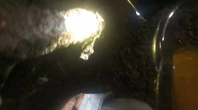 Exiting the manhole
with extra weight - Sewer Divers