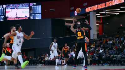 - [faded fans cheering]
- [air whooshing] - Destination NBA: A G League Odyssey