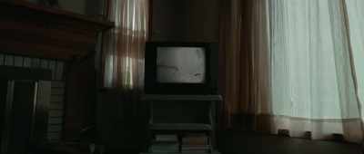 (faint chatter on television) - Wake