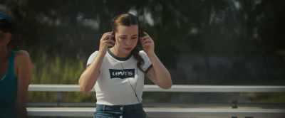 [faint pop music in headphones] - You Gotta Believe