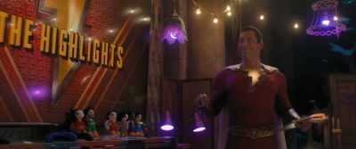 -[fanfare music playing]
-[chuckles, mutters] - Shazam! Fury of the Gods