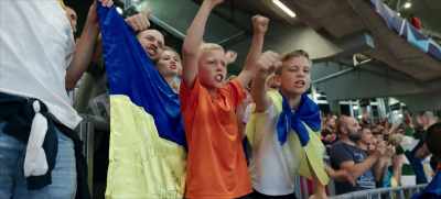 [fans chanting] - Football Must Go On