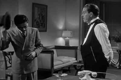 Father who depends on son is happy or foolish according to son - Charlie Chan at Treasure Island