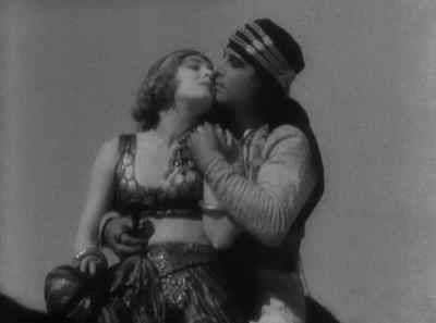 "Father -- the girl --
I love her -- !" - The Son of the Sheik