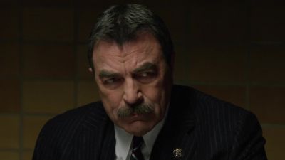 (feet shuffling on floor,
metallic clinking) - Blue Bloods