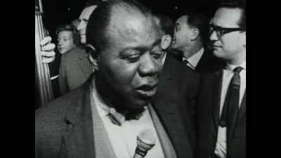 ♪ Fellas she can't get
The fellas she ain't met ♪ - Louis Armstrong's Black & Blues