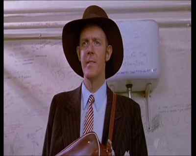 Female attire, I see, sir. - The Adventures of Barry McKenzie