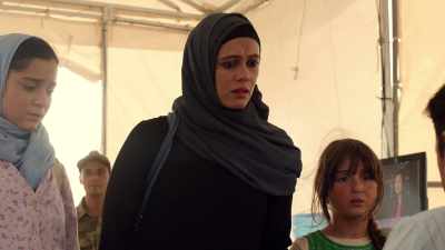 (FEMALE REPORTER
SPEAKING TURKISH OVER TV) - Tom Clancy's Jack Ryan