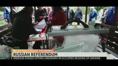 FEMALE REPORTER:
Today marks the second day - Football Must Go On