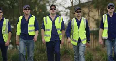 Fifteen look-alike workers arrive on cue. - White Rabbit Project