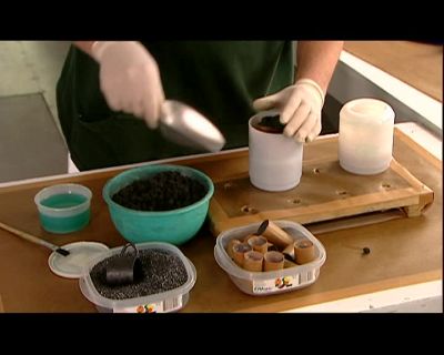 FINALLY, HE GLUES
THE TWO COMPARTMENTS TOGETHER, - How It's Made