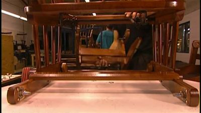 FINALLY, THEY SLIDE IT
UNDER THE SEAT FRAME - How It's Made