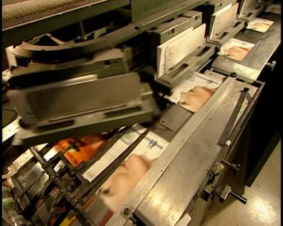 FINALLY,
TWO CONVEYOR BELTS MERGE -- - How It's Made