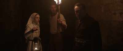"Finit hic, Deo."
God ends here. - The Nun