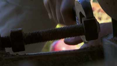 First, Pete needs to loosen this
bolt. - Outback Opal Hunters