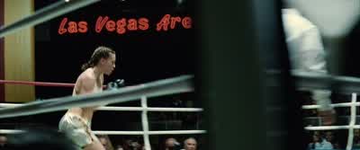 Fitzgerald is pushing The Blue Bear around the ring. - Million Dollar Baby