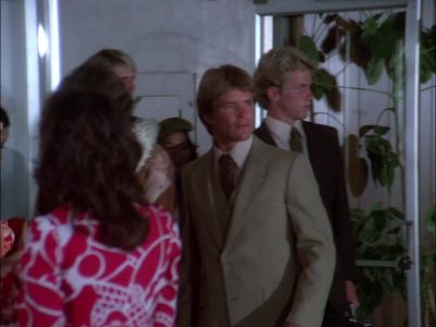 FLIGHT NUMBER 104 FROM CHICAGO
NOW ARRIVING AT GATE 31. - Hawaii Five-O