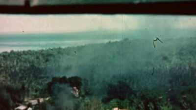 Flying in formation
through the smoke is chaotic. - The Pacific War in Color
