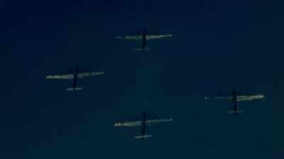 Flying in low, the big slow
planes could be easy targets. - The Pacific War in Color