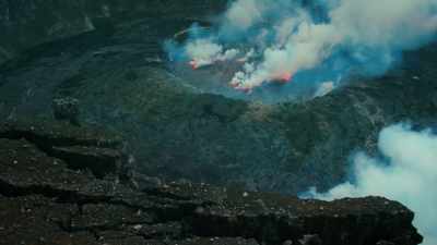For over 20 years he's
ventured into active volcanoes - One Strange Rock