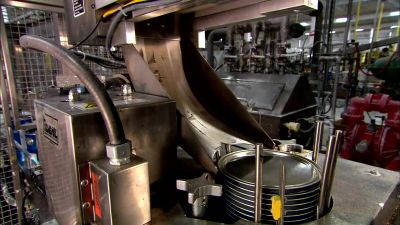 FROM THE FILLING MACHINE
TO A LID DISPENSER - How It's Made